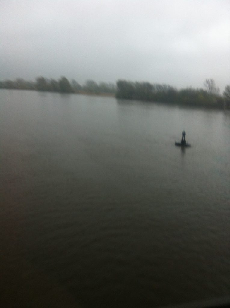Guy on buoy. Picture taken 1h 14min before high water.
