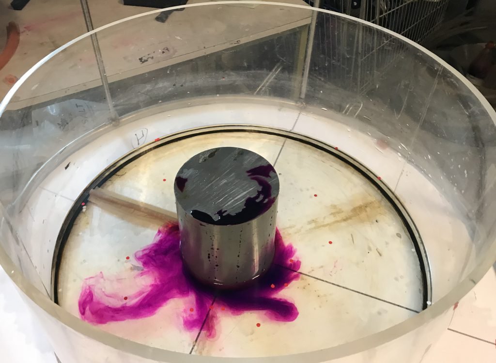 Topographic Rossby waves in a tank - Adventures in Oceanography and ...