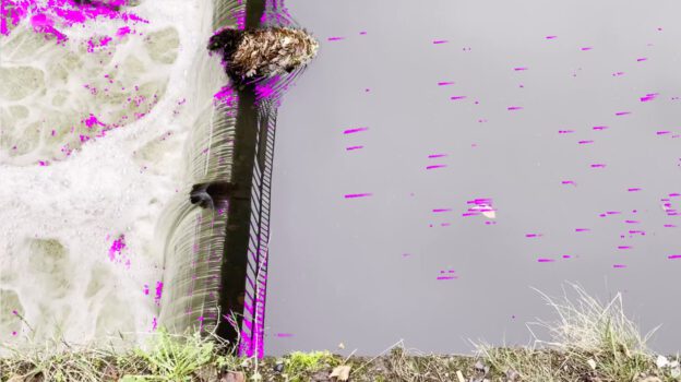 [annotated photo] Photo of water flowing over a weir, annotated with arrows showing particle velocities